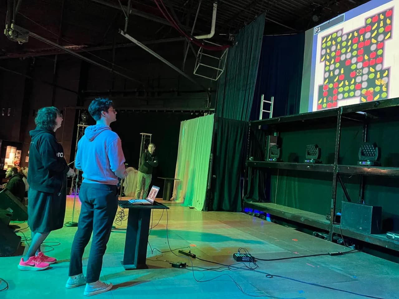 Folks playing locally-made games at Local Game Harvest hosted by louisville Makes Games 2025