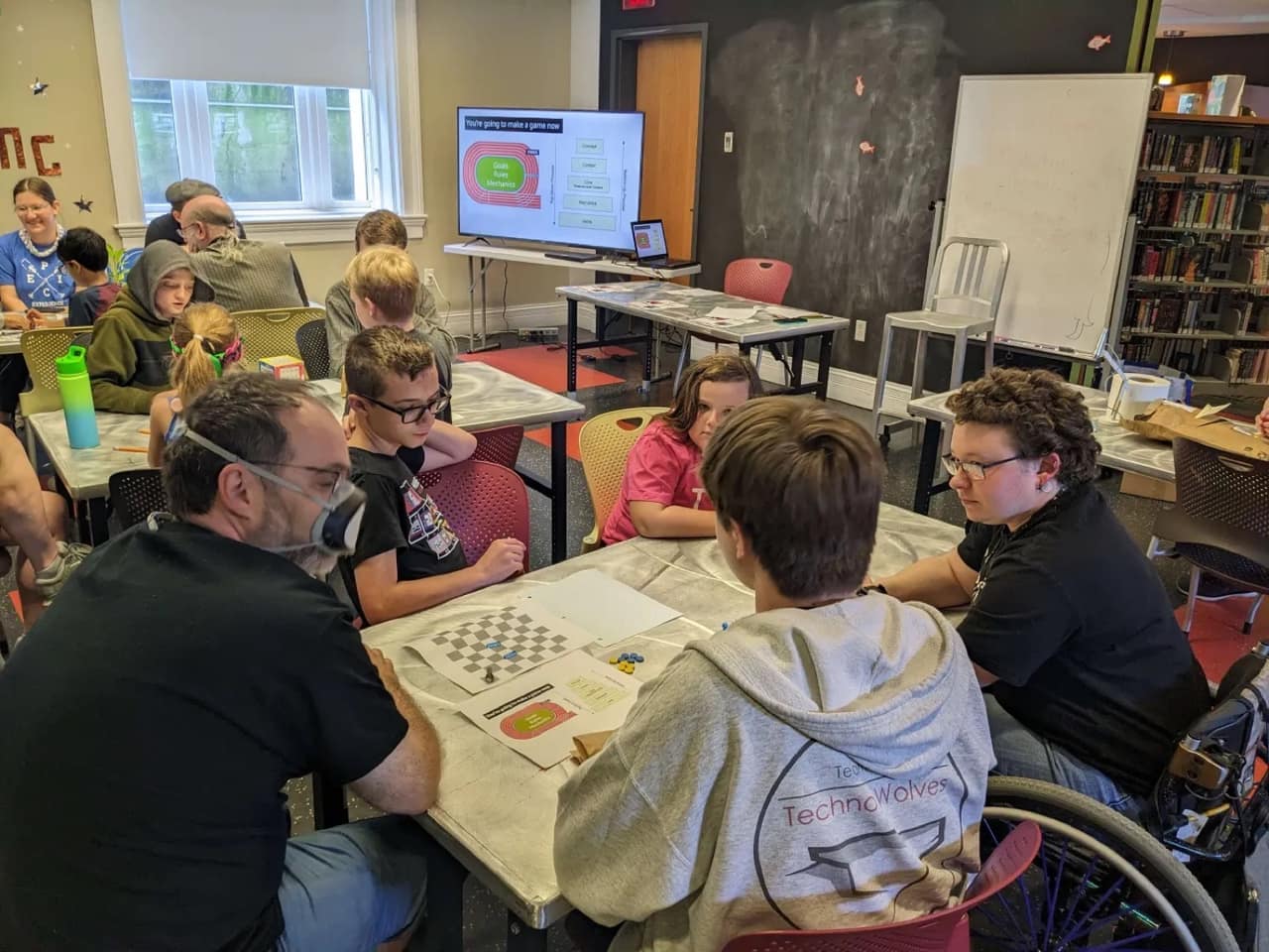 Louisville Makes Games community member Aaron Goodwine teaching a free game design workshop at a local public library