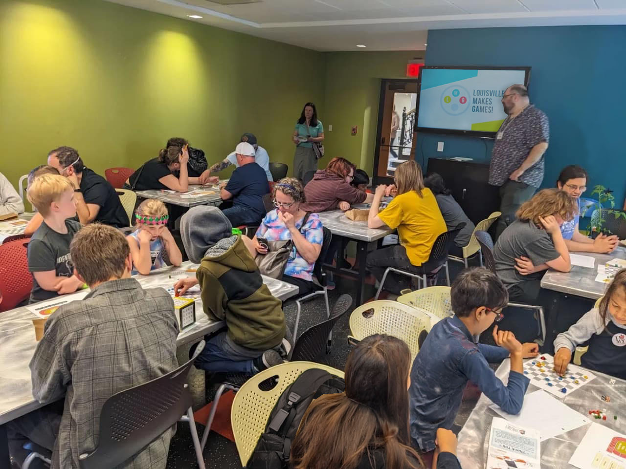Louisville Makes Games community member Aaron Goodwine teaching a free game design workshop at a local public library